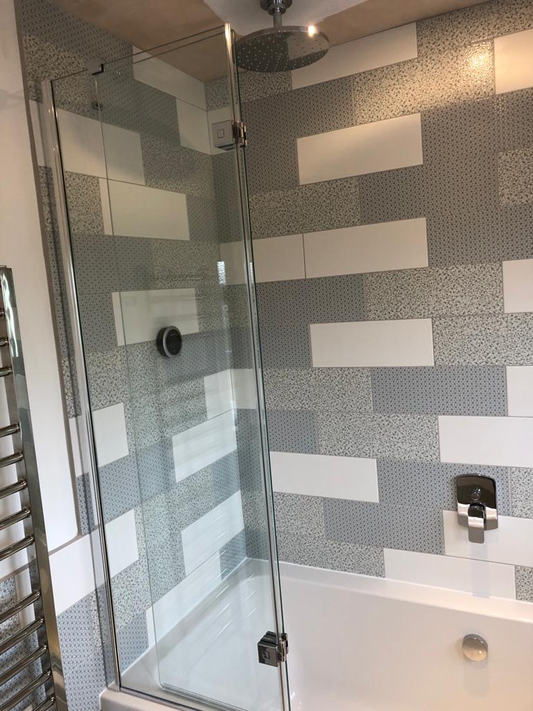 Tiles round the bath